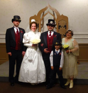 The wedding party in front of the arch. Photo by James Sheridan.